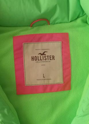 Тепла неонова жилетка з капюшоном hollister3 фото
