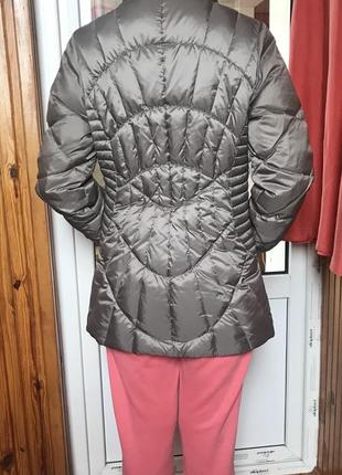 Легка та тепла пухова куртка(не тонка) від відомого німецького бренду2 фото