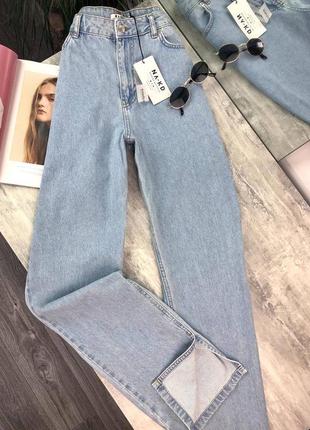 Класичні жіночі джинси на високу посадку з розрізами