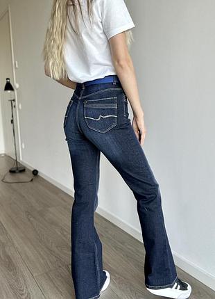 Джинси кльош