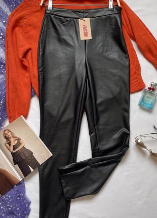 Новые стильные утепленные женские кожаные штаны с молнией внизу6 фото