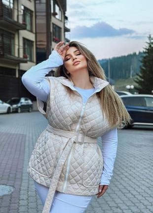 Комфортна стьобана демісезона жилетка9 фото