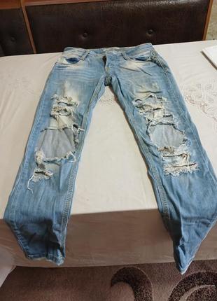 Джинси фірмові рвані