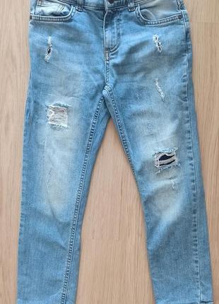 Рвані джинси на 7-8років1 фото