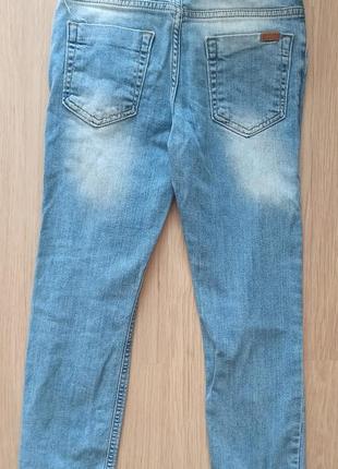 Рвані джинси на 7-8років2 фото