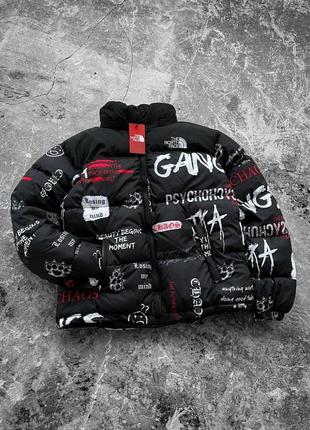 Куртка пуховик черная с принтами4 фото