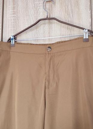Гарненькі світло коричневі брюки штани розмір 56-58-602 фото