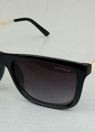 Lacoste очки мужские солнцезащитные черные с золотыми дужками1 фото