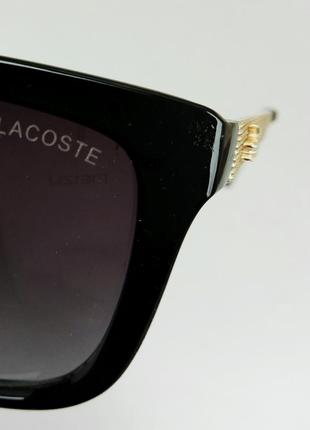 Lacoste очки мужские солнцезащитные черные с золотыми дужками8 фото
