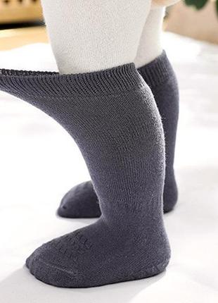 Зимові шкарпетки зі стопперами  антиковзаючі теплі зимові шкарпетки1 фото