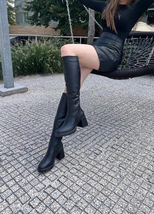 Высокие зимние кожаные шапочки женские на каблуке