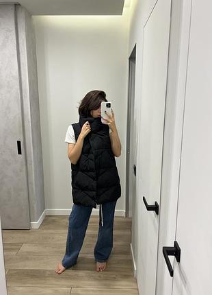 Чорна жилетка