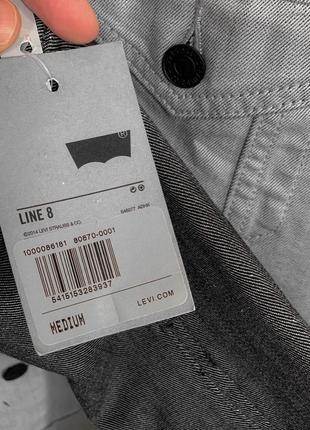 Двоколірна джинсова куртка levis line 84 фото