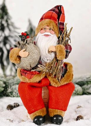 Санта клаус (сидячий), дед мороз1 фото