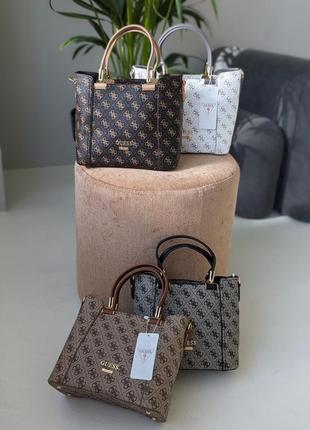 Сумочка guess charm на три филиала.