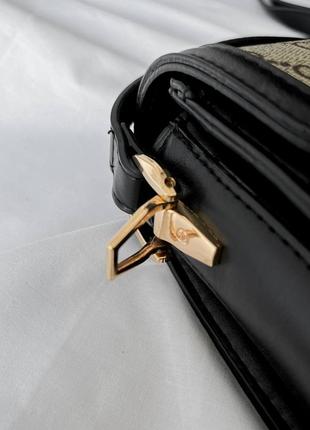Жіноча сумка з екошкіри одне основне відділення два малих текстильна підкладка ремінь регулюється сіра чорна7 фото