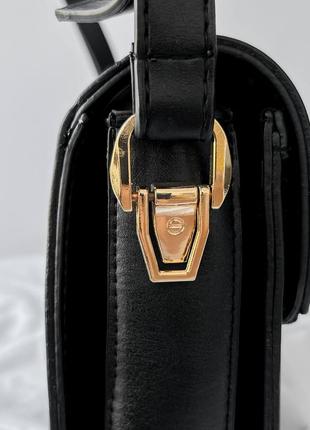 Жіноча сумка з екошкіри одне основне відділення два малих текстильна підкладка ремінь регулюється сіра чорна6 фото