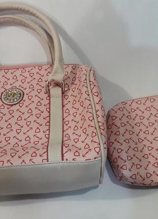 Симпатична сумочка з косметичкою з екошкіри