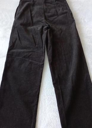 Чорні прямі вельветові брюки.2 фото