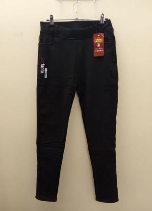 Штани жіночі чорні вузькі на флісі с-4325 . розміри : 3xl;4xl.