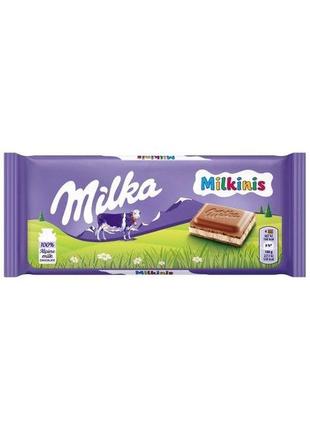 Шоколад молочний з кремовою начинкою milka milkinis, 100 г, швейцарія, мілкініс1 фото