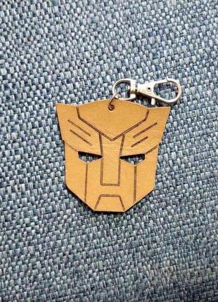 Кожаный брелок-подвеска десептикон