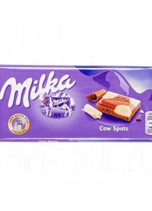 Шоколад молочний з білим milka cow spots, 100 г швейцарія, два шоколади білий і молочний