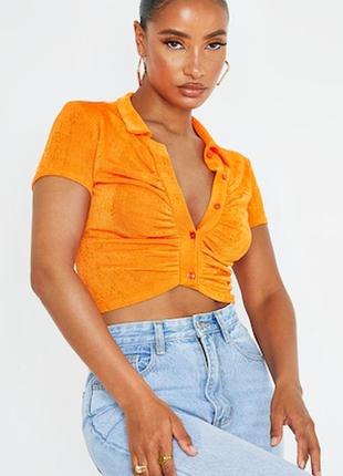 Оранжева футболка на ґудзиках1 фото