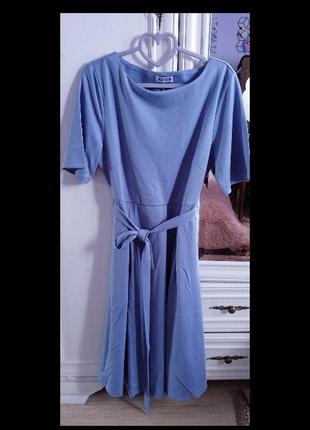 Женское изысканное платьеavon, цвет голубой ой.3 фото