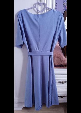 Женское изысканное платьеavon, цвет голубой ой.4 фото