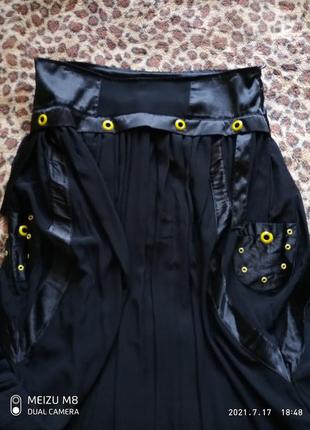 Черная юбка баллон с карманами по бедрам7 фото