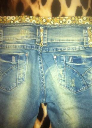 модные рваные джинсы3 фото