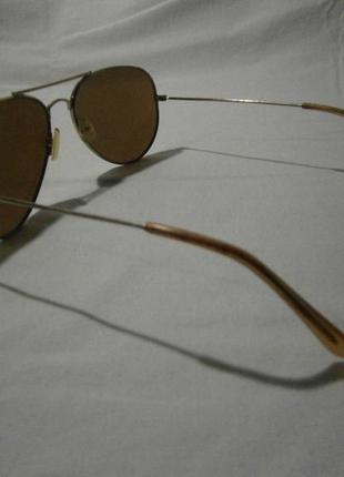 Стильные женские солнцезащитные очки (злолотой цвет ) б/у