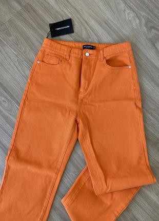 Оранжевые джинсы1 фото