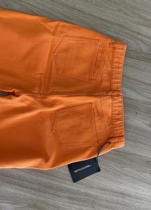 Оранжевые джинсы5 фото