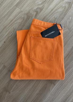 Оранжевые джинсы7 фото