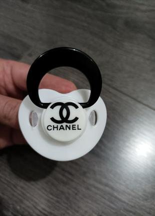 Соска детская пластмассовая ортодонтическая силиконовая.