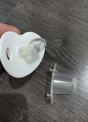 Соска детская пластмассовая ортодонтическая силиконовая.