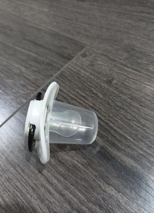 Соска детская пластмассовая ортодонтическая силиконовая.