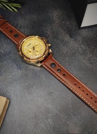 Чоловічий класичний наручний годинник skmei золотий5 фото