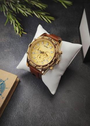 Чоловічий класичний наручний годинник skmei золотий3 фото