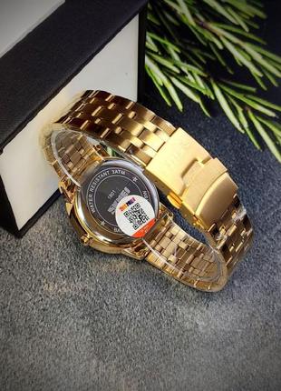 Чоловічий класичний наручний годинник skmei золотий3 фото