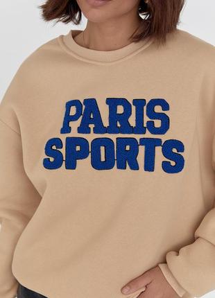 Теплый женский свитшот на флисе с надписью paris sports.8 фото
