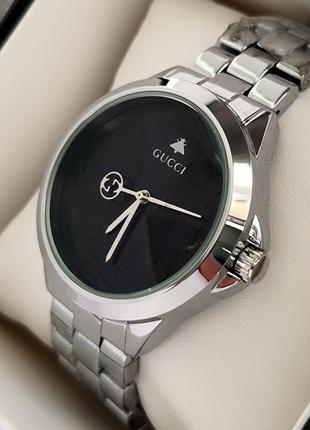 Наручний жіночий годинник сріблястого кольору з чорним циферблатом3 фото