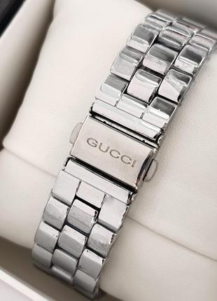 Наручний жіночий годинник сріблястого кольору з чорним циферблатом5 фото