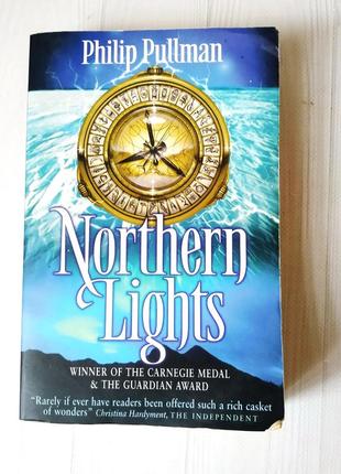 Книга на английском philip pullman - northern lights северное сияние