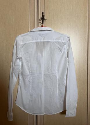 Біла блуза з рюшами2 фото