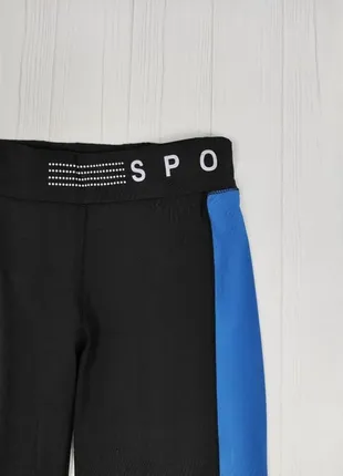 Лосины штаны спортивные женские crivit 42/44 черные с синими вставками3 фото