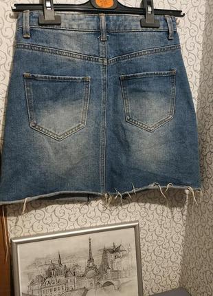 Короткая джинсовая юбка.4 фото