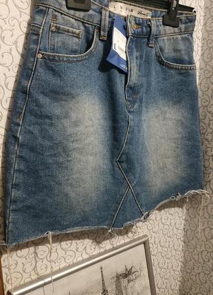 Короткая джинсовая юбка.2 фото